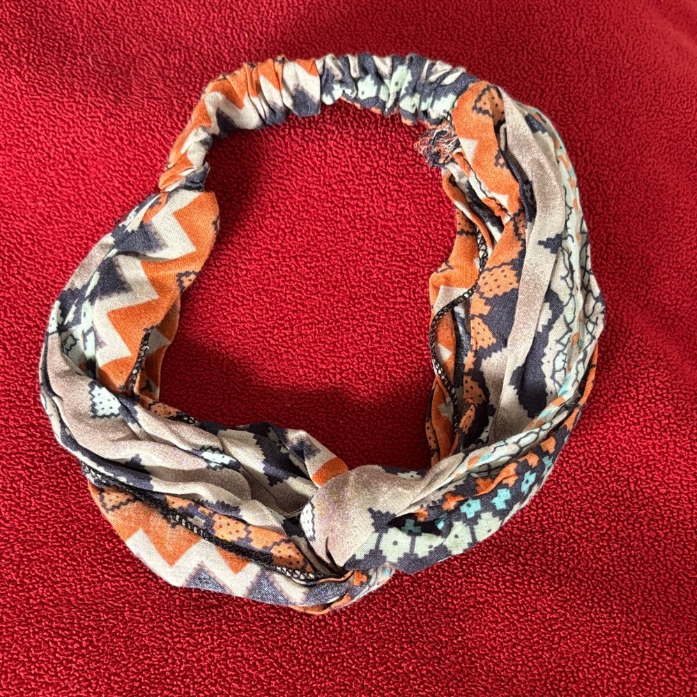 Patterned Headband with Orange and Black Accents